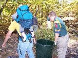 Roy & Jim Carry the fish back to the upper lake